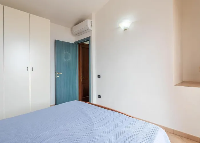 6 Сasa de vacaciones Porto Corallo